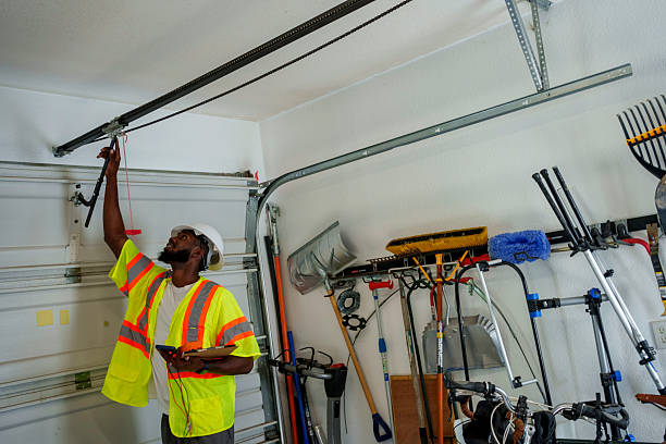 Professional Garage Door Panel Replacement technician working in Greenfield, OH